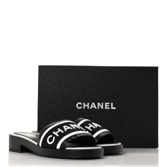 Chanel Shoes | Chanel Black White Lambskin Logo Slide Sandals - Size 38 or 7.5 - Nwt | Color: Black/White | Size: 7.5 | Samaposh's Closet